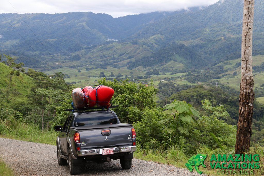 A truck carrying kayaks