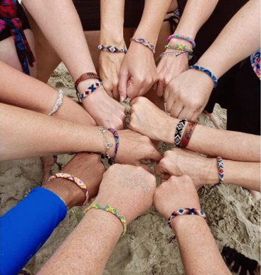 Moms fists in a circle